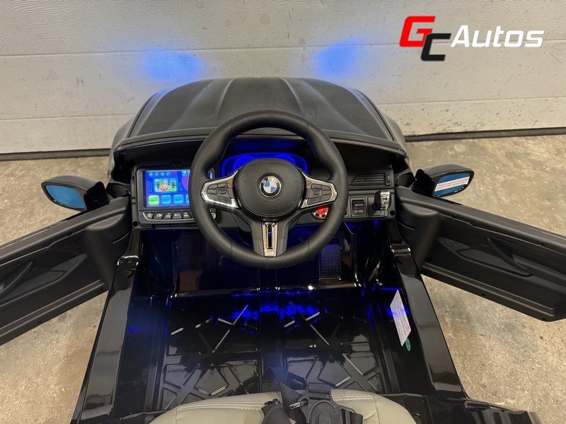 Voiture électrique BMW M5 24V MP4 (10 mois/5 ans) - noir